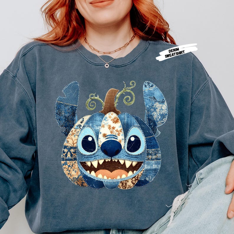 🎃 Cozy Disney Halloween Sweatshirt – Patchwork Stitch Pumpkin Pullover
Celebrate spooky season in magical style with this adorable Stitch pumpkin sweatshirt, featuring a patchwork pumpkin design in rich denim and floral patterns. Perfect for Disney Halloween outfits, fall trips to the parks, or cozy autumn nights. This unisex crewneck makes the ultimate gift for Disney lovers, pumpkin spice fans, and anyone who loves cute and spooky fashion. Soft, comfortable, and perfect for Halloween parties
