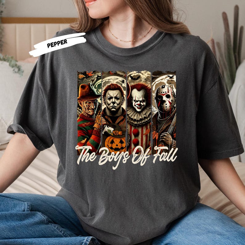 Get ready for spooky season with this “The Boys of Fall” horror movie shirt featuring four of the most iconic scary movie villains — Freddy Krueger, Michael Myers, Pennywise, and Jason Voorhees 🔪🎈. Perfect for horror fans, this graphic tee combines creepy Halloween vibes with fall colors, making it a must-have for scary movie marathons, haunted houses, and October nights. Soft, comfortable, and ideal for any horror lover’s fall wardrobe.