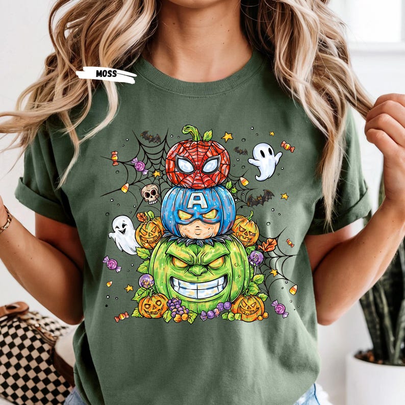 Get ready to turn heads this Halloween with our Stacked Superhero Pumpkin Shirt! 🎃💥 This fun and spooky fall tee features your favorite Marvel-inspired heroes — Spider-Man, Captain America, and Hulk — as adorable carved pumpkins stacked high in festive Halloween flair! 👻🕸️