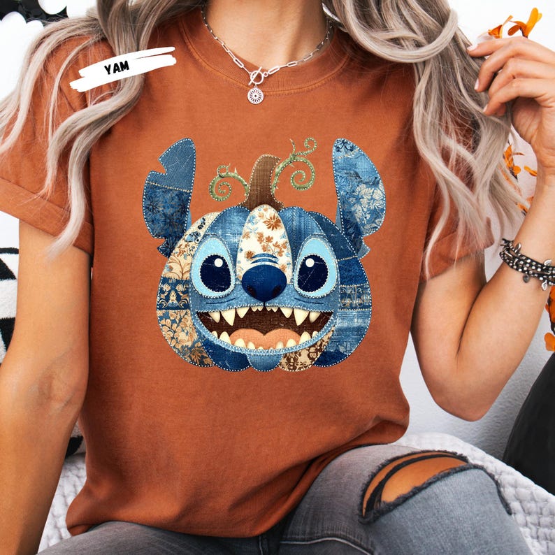 🎃 Cozy Disney Halloween Sweatshirt – Patchwork Stitch Pumpkin Pullover
Celebrate spooky season in magical style with this adorable Stitch pumpkin sweatshirt, featuring a patchwork pumpkin design in rich denim and floral patterns. Perfect for Disney Halloween outfits, fall trips to the parks, or cozy autumn nights. This unisex crewneck makes the ultimate gift for Disney lovers, pumpkin spice fans, and anyone who loves cute and spooky fashion. Soft, comfortable, and perfect for Halloween parties