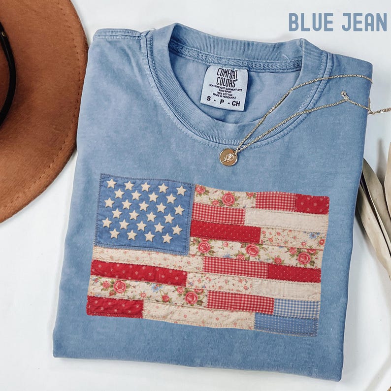 Comfort Colors blue jean t-shirt with retro faux patchwork American flag design in red white and blue vintage style perfect for 4th of July patriotic outfit.