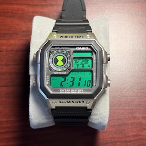 May include: A rustic wooden sign with the text "Welcome to our home" in white lettering. The sign features a distressed finish and a simple, inviting design, perfect for entryway decor.