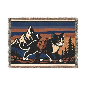 Cozy mountain hiking cat Woven Blanket - Perfect for Camping, Outdoor Lovers, Pet Owners, Home Decor, Gift