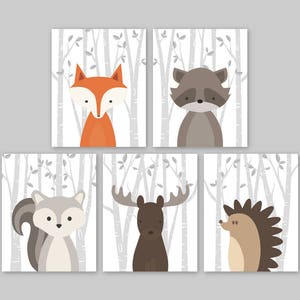 May include: Set of five printable nursery art prints featuring woodland animals in a gray and white birch tree forest. The animals include a fox, raccoon, squirrel, moose, and hedgehog.
