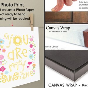 May include: A white photo print with the text "You are my Sunshine" surrounded by colorful flowers and birds. The print is available as a photo print or a canvas wrap.