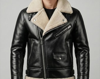 May include: Black leather jacket with a cream-colored shearling collar and lining. The jacket features a diagonal zipper closure, multiple pockets, and shearling trim at the cuffs and hem. A classic aviator style.