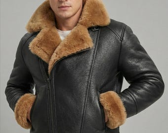 May include: Black leather jacket with a shearling collar and cuffs. The jacket features a zip closure, side pockets, and a buckled waist belt. The shearling is a light brown color.
