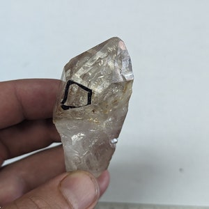Moving Inclusion (Enhydro) Inside Tibetan Smokey Quartz Crystal