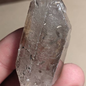 Moving Inclusion (Enhydro) Inside Tibetan Smokey Quartz Crystal