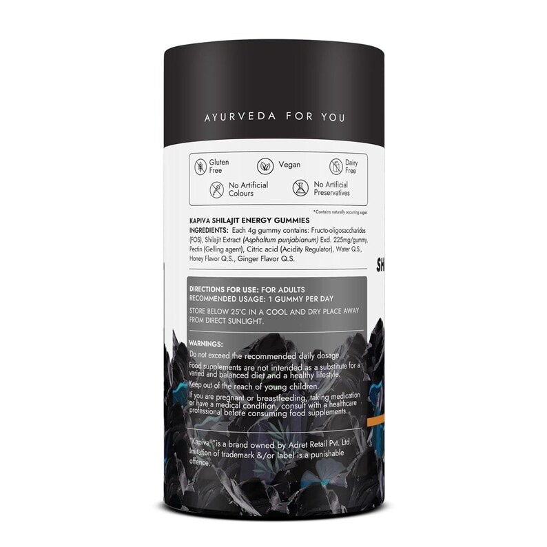 K&ouml;nnte beinhalten: Ein zylindrischer schwarz-wei&szlig;er Beh&auml;lter mit Kapiva Shilajit Energy Gummies. Das Etikett enth&auml;lt Text zu Inhaltsstoffen, Anwendung und Warnhinweisen. Das Produkt ist glutenfrei, vegan und milchfrei, ohne k&uuml;nstliche Farbstoffe oder Konservierungsmittel.