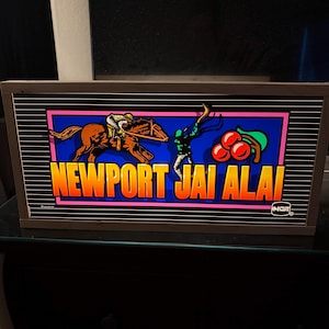 Vintage Glass Slot Machine – Old Vegas Collectible (Newport Jai Alai)