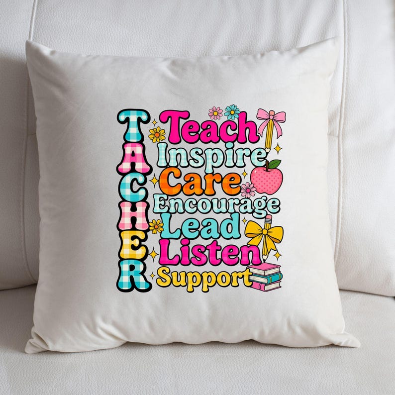 May include: A white square pillow with the word "TEACHER" stacked vertically in a colorful, retro font. The words "Teach, Inspire, Care, Encourage, Lead, Listen, Support" are arranged below. Floral and apple graphics complete the design.