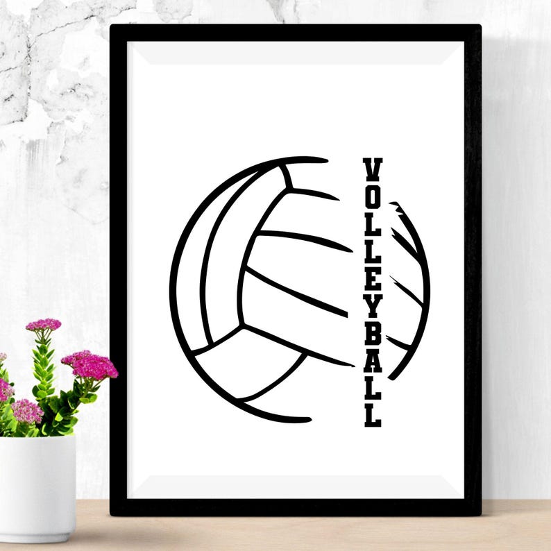 May include: Black framed print featuring a stylized volleyball graphic. The volleyball is depicted in black lines against a white background, with the word "VOLLEYBALL" printed vertically on the right side. A decorative piece for sports enthusiasts.