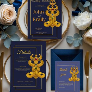 May include: Navy blue wedding invitation suite with gold accents. The invitation features the names "John and Emily" and event details. Includes RSVP, details, and thank you cards, all with a decorative gold emblem.