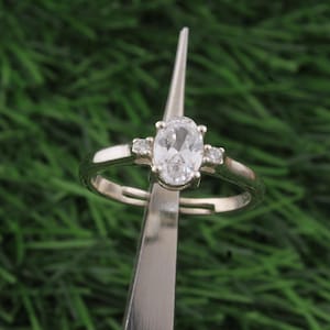 Dainty Sterling Silver Cubic Zirconia Ring: Three Stone Engagement