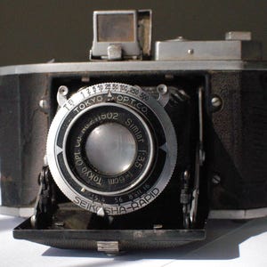 Tokyo Kogaku Minion folding camera for 127 roll film.  Made in Japan about 1938