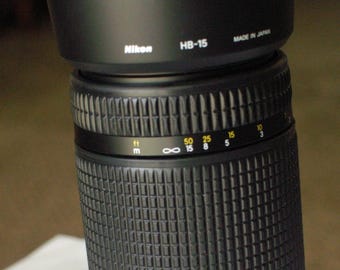 Nokia ED AF Nikkor 70-300mm 1:4-5,6 D Zoom-Objektiv für Spiegelreflexkameras  Inklusive Gegenlichtblende, Schutzfilter und hinterem Objektivdeckel