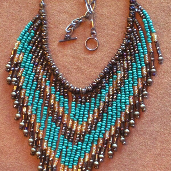 Native American tribal style fringed necklace in teal, gold and bronze