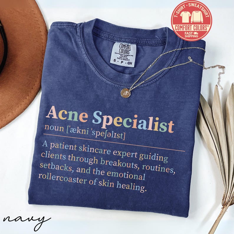 Navy Comfort Colors t-shirt defining "Acne Specialist" with description.
