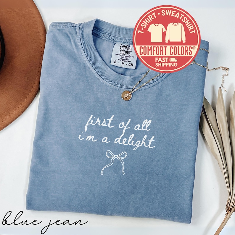 First of all i'm a delight t-shirt, comfy casual wear, sassy statement shirt, blue jean color, fast shipping, perfect gift choice
