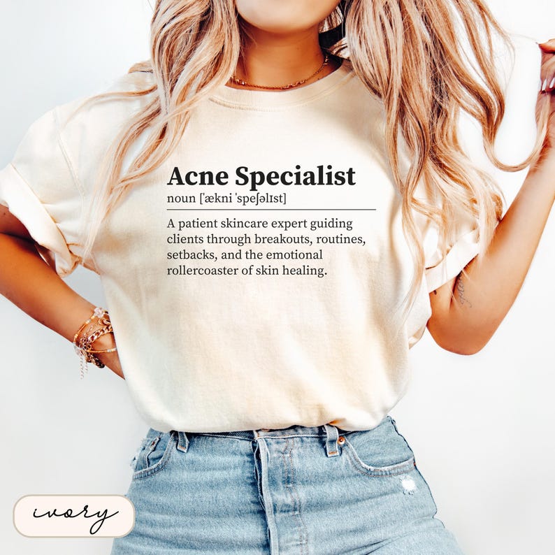 Cream t-shirt with "Acne Specialist" definition in black text.
