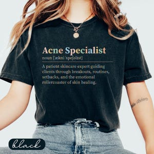 Black t-shirt with "Acne Specialist" and description of a skincare expert.