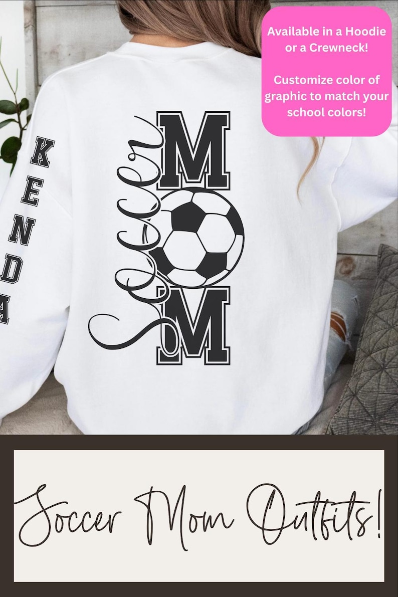 May include: White sweatshirt with a black soccer ball graphic and the words "Soccer Mom" in a stylized font. The word "MOM" is in bold block letters. The sleeve has the name "KENDA" in block letters. The text "Soccer Mom Outfits!" is at the bottom.