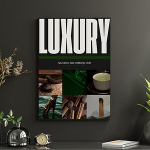 May include: A framed print with the word "LUXURY" in large white letters. Below, a green banner reads "Abundance - Ease - Wellbeing - Order". The print features images of natural elements, including wood, fabric, tea, and incense.