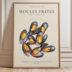 May include: A framed wall art print on a cream background featuring a watercolor illustration of blue and orange mussels. The text reads FRENCH BISTRO, MOULES FRITES, Moules à la Marinière, briny • crisp • classic, and FRENCH KITCHEN COLLECTION No.16.