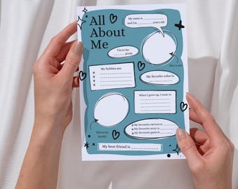May include: A teal "All About Me" fill-in-the-blank sheet with speech bubbles and hearts. The sheet includes prompts for name, age, grade, hobbies, favorite color, and future aspirations. The sheet is held by two hands.