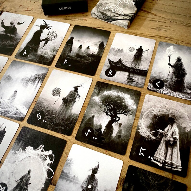 May include: A set of 10 black and white tarot cards with intricate illustrations and runes. The cards feature a variety of mystical and symbolic imagery, including trees, figures, and abstract patterns.