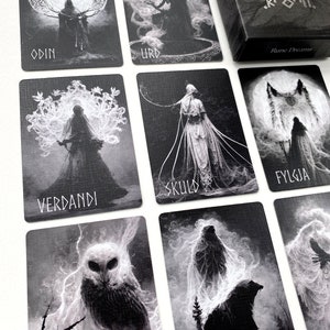 May include: Black and white tarot cards with images of Norse mythology figures and runes. The cards feature images of Odin, Urd, Verdandi, Skuld, Fylgja, Hamr, and other figures. The cards are part of a deck called "Rune Dreams".