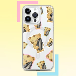 May include: Transparent phone case with a repeating pattern of cartoon bears clutching sunflower seeds. The bears are tan with brown details. The case is set against a yellow backdrop with pink and blue shapes.