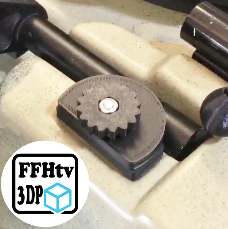 May include: A black 3D-printed gear-shaped adjustment knob mounted on a beige textured surface. The gear features a central silver metal bolt and is positioned next to a black cylindrical rod. A circular logo with the text FFHtv 3DP is visible.