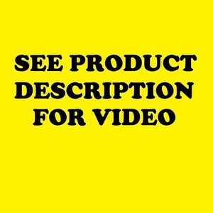 May include: A bright yellow square graphic featuring the bold black text SEE PRODUCT DESCRIPTION FOR VIDEO centered in the middle. The design is simple and uses high contrast colors to display the instructional message clearly for all viewers.