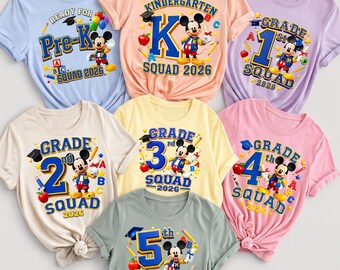 May include: A collection of seven colorful t-shirts featuring Mickey Mouse graphics and school-themed text. Each shirt displays a specific grade level from Pre-K to 5th grade, the text Squad 2026, and various school supplies like pencils, apples, and books.