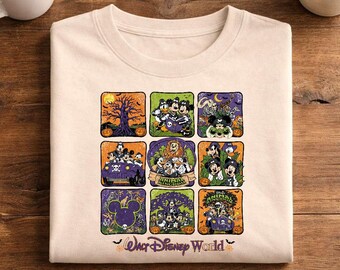 May include: A beige t-shirt featuring a grid of nine colorful illustrations depicting various Disney characters in Halloween-themed scenes, including pumpkins and trees. The text "Walt Disney World" is printed in a script font at the bottom.