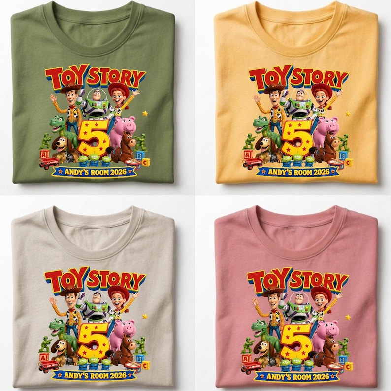 May include: Four t-shirts in olive, yellow, beige, and dusty pink, each featuring a Toy Story graphic with characters, a large yellow number 5, and the text "TOY STORY" and "ANDY'S ROOM 2026" printed on the front of the crew neck garments.