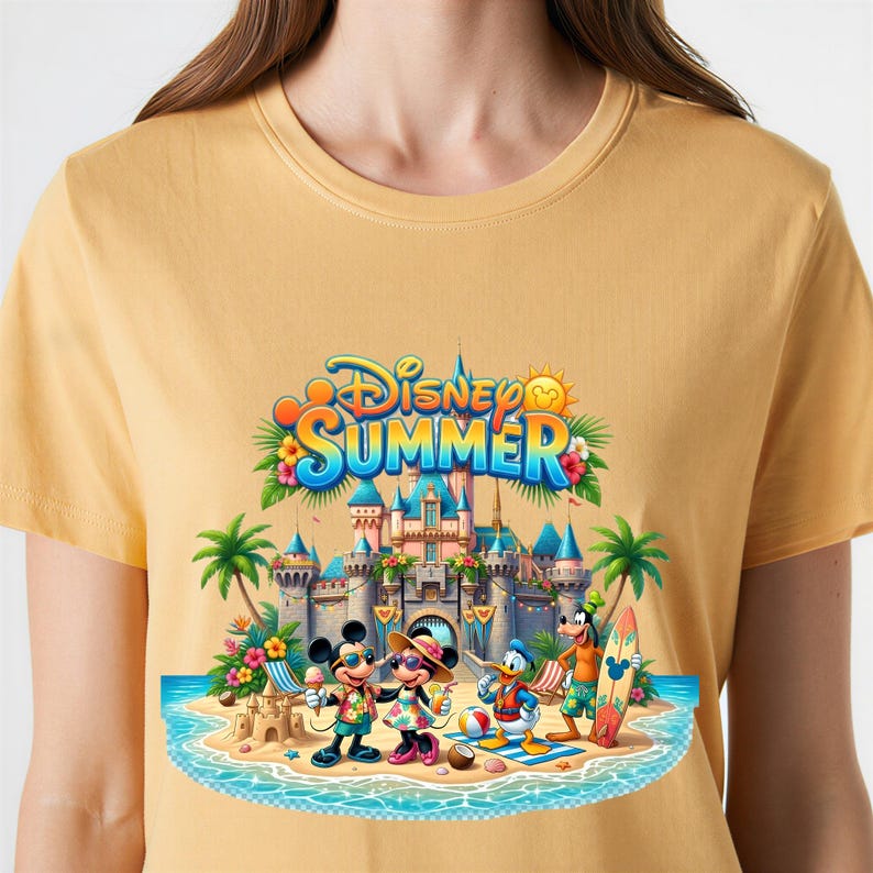 May include: A mustard yellow t-shirt featuring a colorful graphic of Mickey Mouse, Minnie Mouse, Donald Duck, and Goofy on a beach in front of a castle. The text Disney SUMMER is printed in blue and orange above the characters with palm trees and flowers.