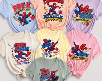 May include: A collection of seven short-sleeve t-shirts in various pastel colors, each featuring a graphic of Spider-Man, a pencil, an apple, and text indicating school grade levels from Pre-K to 5th Grade, all with the phrase Swinging Into School.