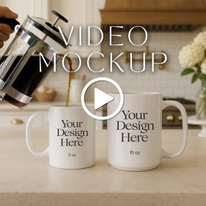 May include: A French press pouring coffee into two white ceramic mugs. The mugs have the text "Your Design Here" and are labeled 11 oz and 15 oz. The scene is set in a kitchen with a neutral color palette.
