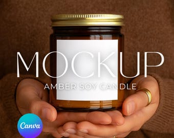 May include: A brown glass jar with a gold lid, labeled "MOCKUP AMBER SOY CANDLE" in white text. The jar is held in cupped hands, with gold rings on the fingers. A Canva logo is in the lower left corner.