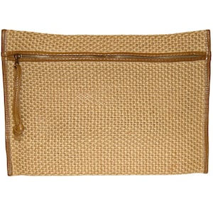 May include: A brown woven clutch bag with a zipper closure and a brown leather pull tab.