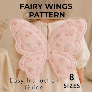 May include: Pink fairy wings with a floral pattern and star accents. The wings are quilted and have a scalloped edge. Text on the image reads "Fairy Wings Pattern", "Easy Instruction Guide", and "8 Sizes".