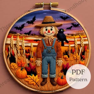 May include: An autumnal embroidery hoop design with a scarecrow in blue overalls, pumpkins, and falling leaves. A black crow is perched on the right. The background depicts a sunset and bats. The text "PDF Pattern" is visible.