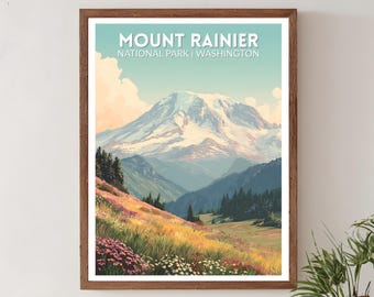 May include: A framed print of Mount Rainier National Park in Washington. The artwork depicts a snow-capped mountain, lush green hills, and a field of wildflowers under a blue sky. The text "Mount Rainier National Park | Washington" is at the top.