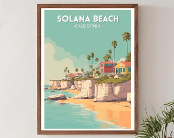 May include: A framed art print featuring a coastal scene of Solana Beach, California. The artwork depicts colorful houses on a cliff overlooking a sandy beach and ocean. The sky is a light blue with white clouds, and palm trees are scattered throughout the scene.