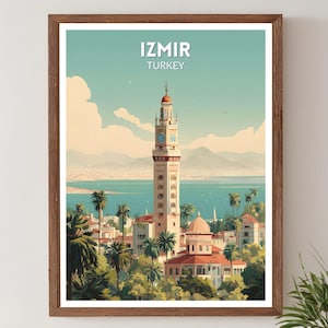 May include: A framed art print featuring a stylized illustration of Izmir, Turkey. The image showcases a tall clock tower, buildings with red tile roofs, palm trees, and a coastal landscape under a blue sky. The text "IZMIR TURKEY" is at the top.