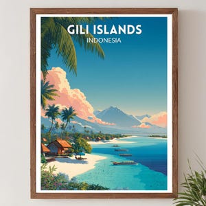 May include: Framed art print of Gili Islands, Indonesia. The artwork depicts a tropical beach scene with turquoise water, boats, palm trees, and mountains under a blue sky with fluffy clouds. The print is in a brown wooden frame.