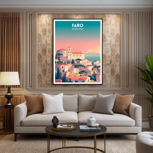 May include: A framed art print featuring a stylized illustration of Faro, Portugal. The artwork depicts a coastal town with white buildings, red rooftops, and green trees under a gradient sky. Text at the top reads "FARO PORTUGAL."